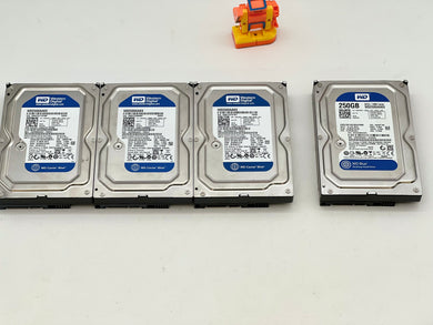 Western Digital (x3) WD2500AAKX-753CA1, (x1) WD2500AAKX-75U6AA0 250GB Hard Drive *Lot of (4)* (Used)