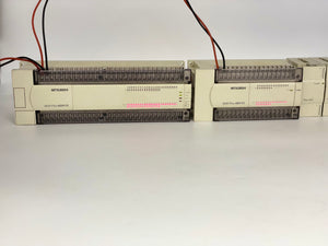 Mitsubishi MELSEC PLC FX2N-80MR-DS, FX2N-48ER-DS, FX2N-16EX-ES/UL, (2) FX2N-16EYR-ES/UL, FX2N-8EX-ES/UL (Used)